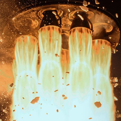 Rocket engines firing at liftoff